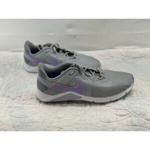 Gray and purple Nikes women’s 10